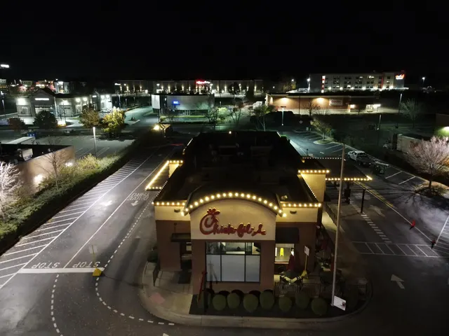 Elevated view of Christmas lights around a commercial building